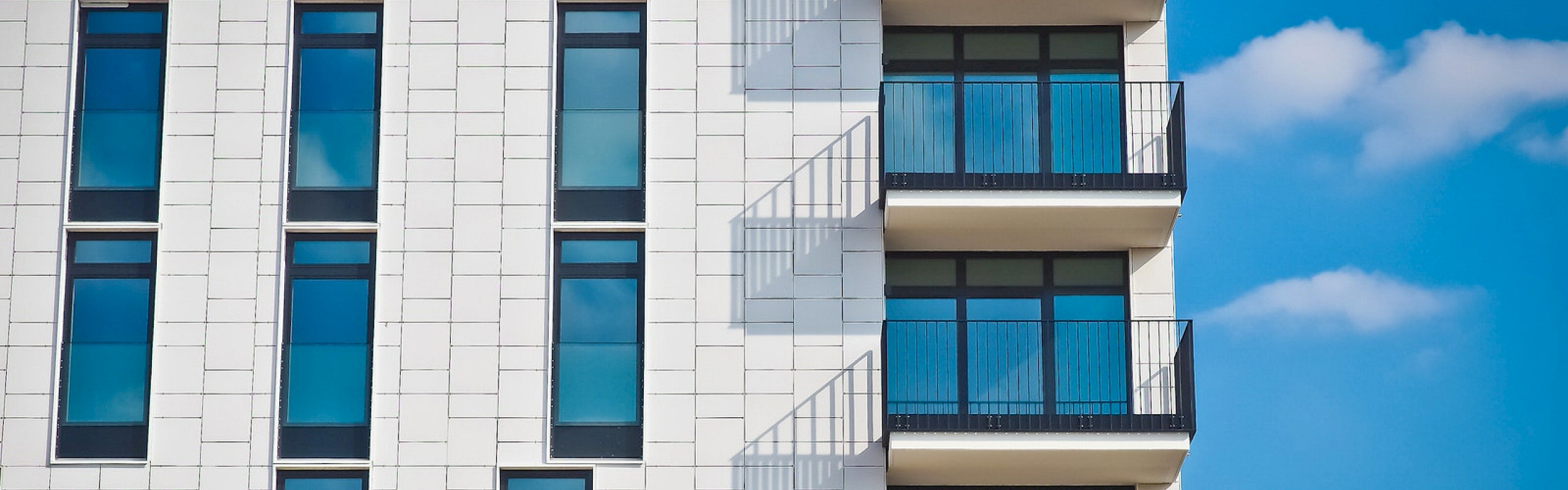 Exterior photo of a high-rise apartment building